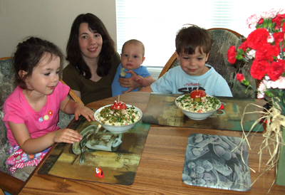 Melanie and her kids at the table
