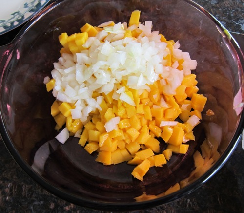 mango-salsa-step-bowl chopped mango and onion in a bowl