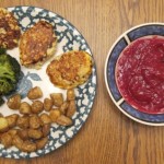dinner of salmon fishcakes, roasted new potatoes, broccoli and cocktail sauce