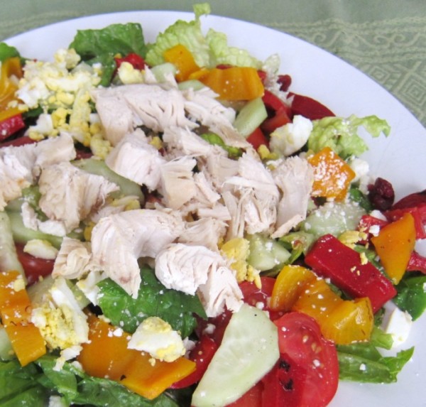 chopped green salad with chicken and roasted peppers