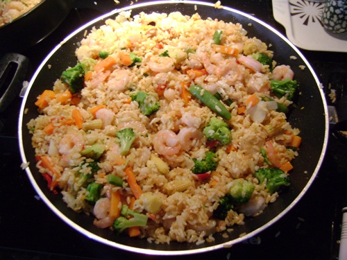 shrimp fried rice on the frying pan