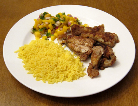 catfish nuggets with yellow rice and mango salsa