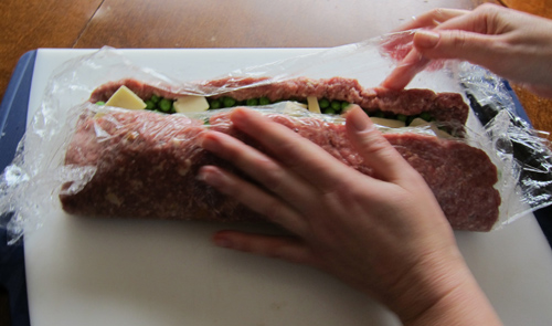 making stuffed meatloaf with eggs, cheese and peas - step 2