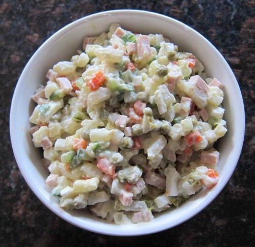 russian potato salad olivier in a bowl