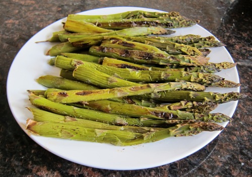 roasted asparagus served on a plate