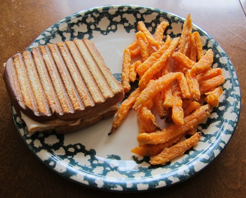 sweet potato fries with turkey and cheese grilled panini sandwich