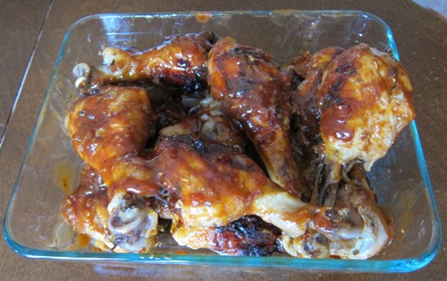 dish with barbecued chicken legs