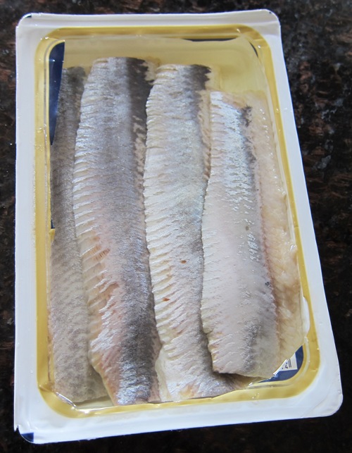 opened package of herring fillets