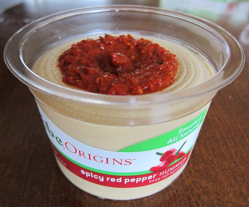 tub of spicy red pepper hummus