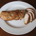 sliced roasted turkey breast tenderloin on a plate