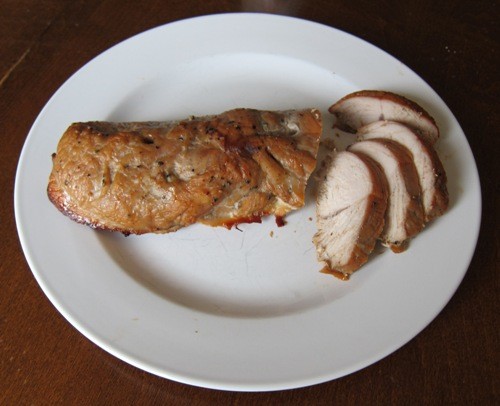 sliced roasted turkey breast tenderloin on a plate