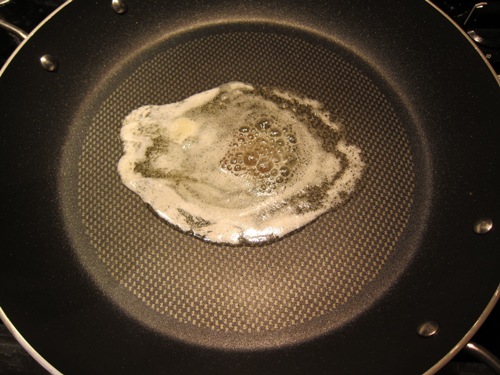 melting butter on a frying pan