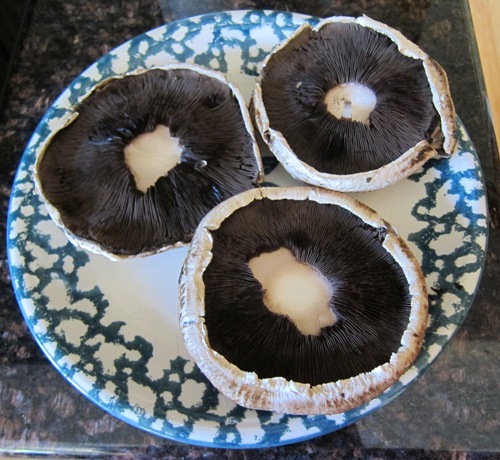 portobello mushroom caps on a plate