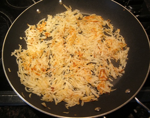 costco dehydrated dried hashbrowns in a frying pan