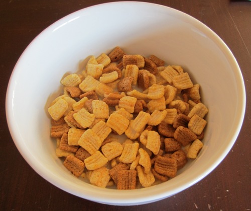fiber one honey squares cereal in a bowl with milk