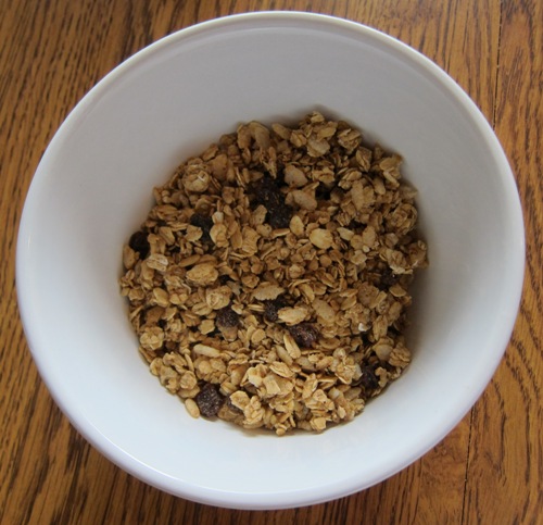 cinnamon raisin granola in a bowl without milk