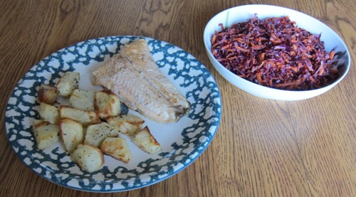 Dinner Of Rainbow Trout With Roasted Potatoes And Red Cabbage Slaw