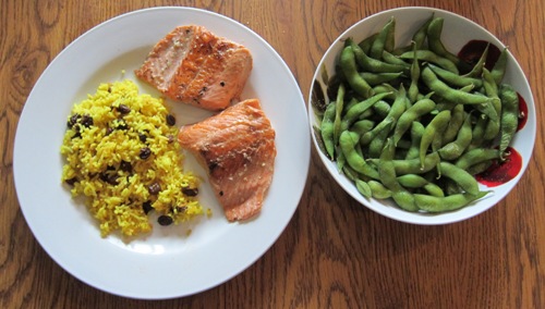 salmon with yellow rice and edamame