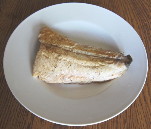 cooked rainbow trout fish on the plate