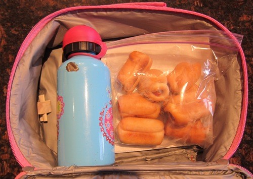 packing bagel dogs in a lunch box