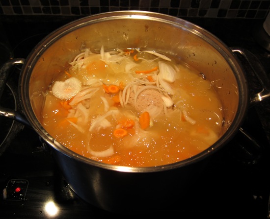 gefilte fish boiling in a pot of water