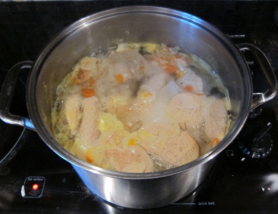 cooked gefilte fish in a pot