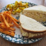 chicken salad sandwich with mango salsa and sweet potato fries