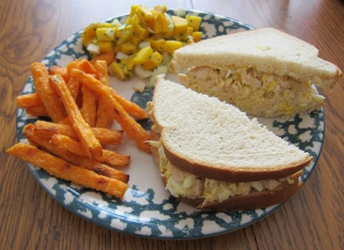 chicken salad sandwich with mango salsa and sweet potato fries