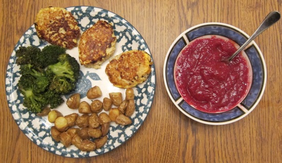 dinner of salmon fishcakes, roasted new potatoes, broccoli and cocktail sauce