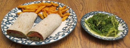 Dinner Of Salmon Avocado Wraps, Sweet Potato Fries And Seaweed Salad