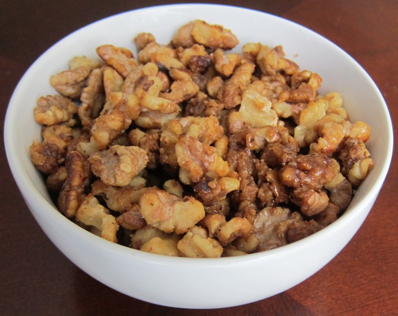a bowl of candied walnuts appetizer