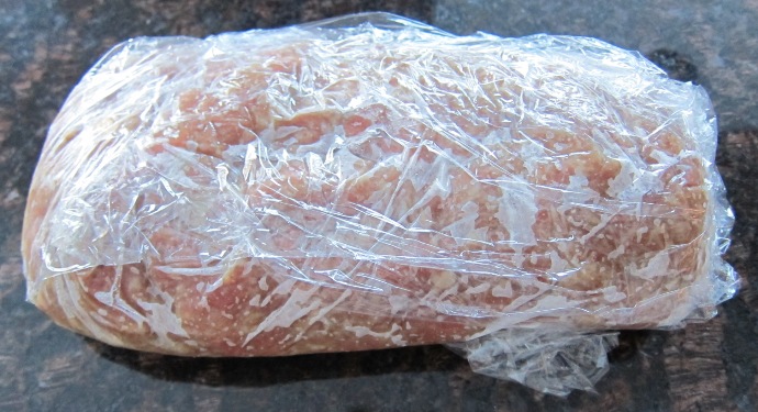 frozen meatloaf wrapped in plastic wrap