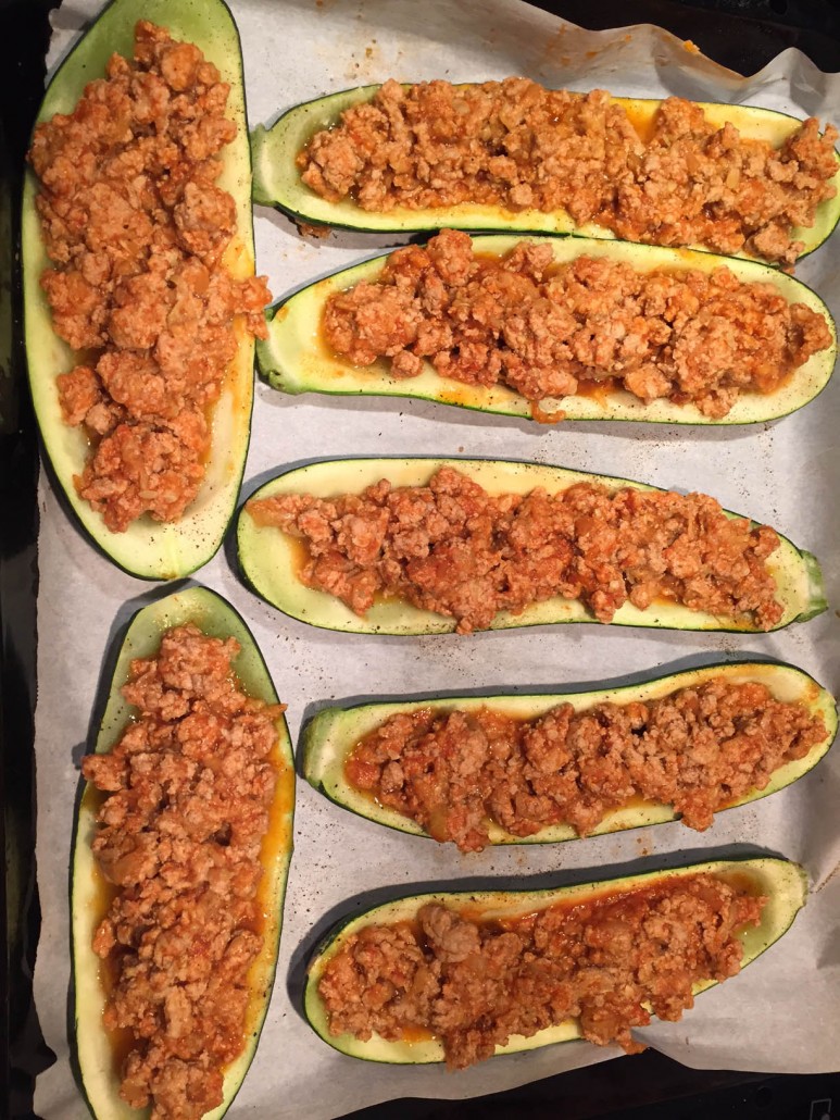 Stuffing the zucchini boats with meat