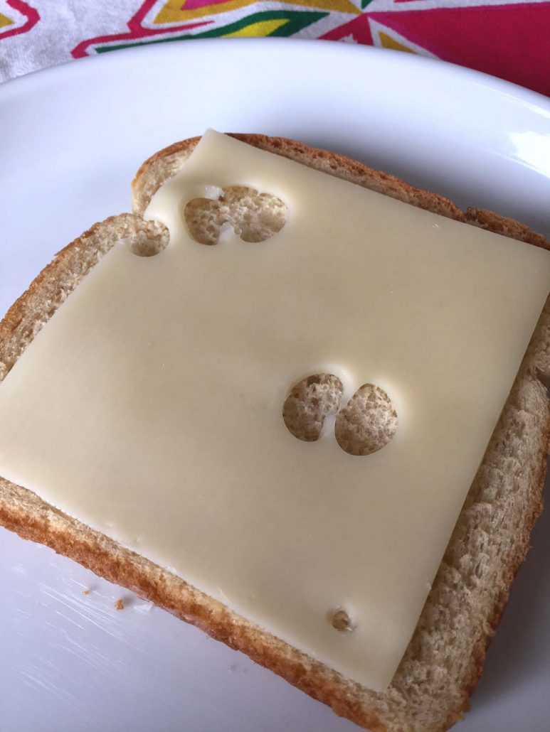Slice of cheese on bread