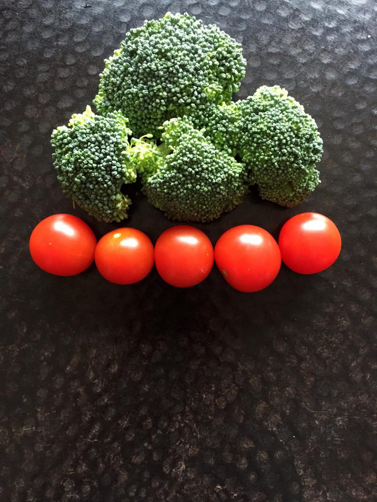 Broccoli and tomato Christmas tree