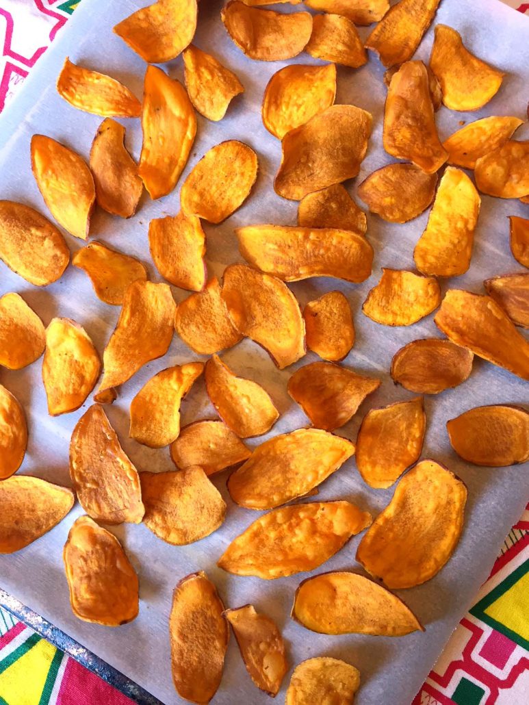 Baked Sweet Potato Chips On A Baking Sheet