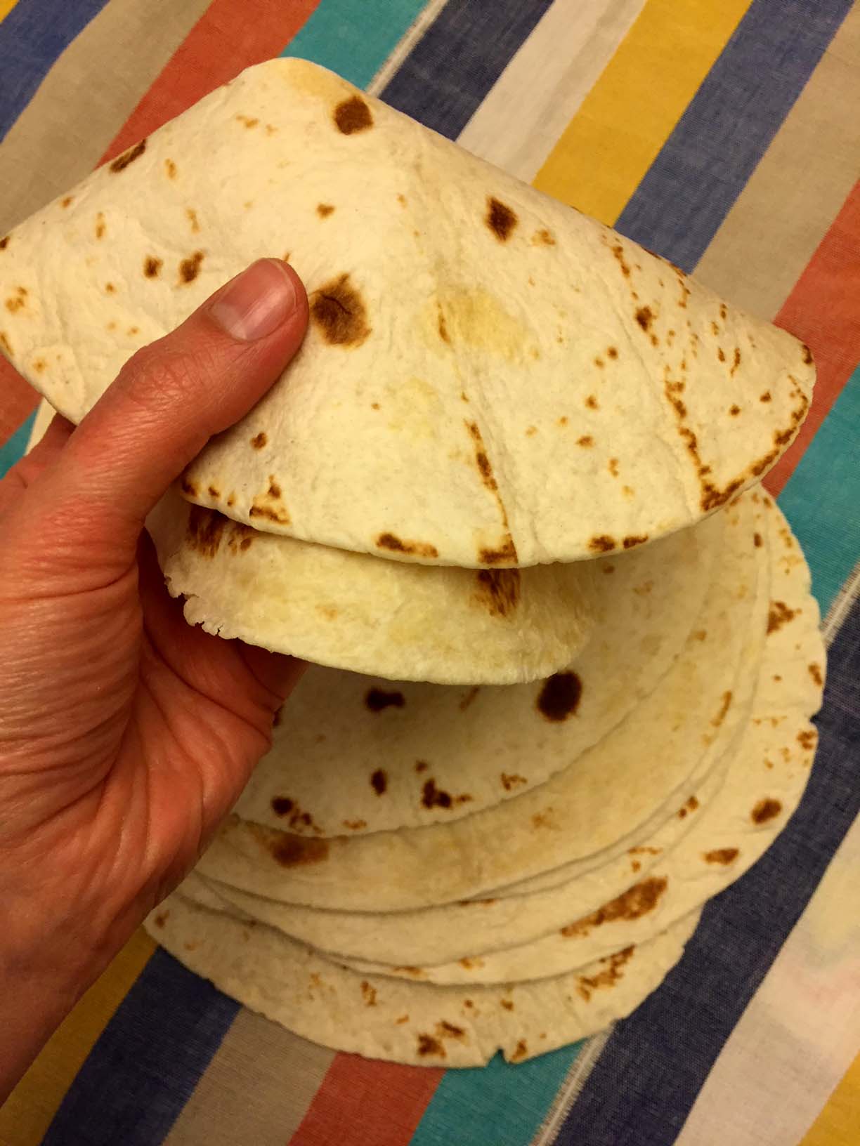 https://www.melaniecooks.com/wp-content/uploads/2017/11/tortillas_how_to_make.jpg