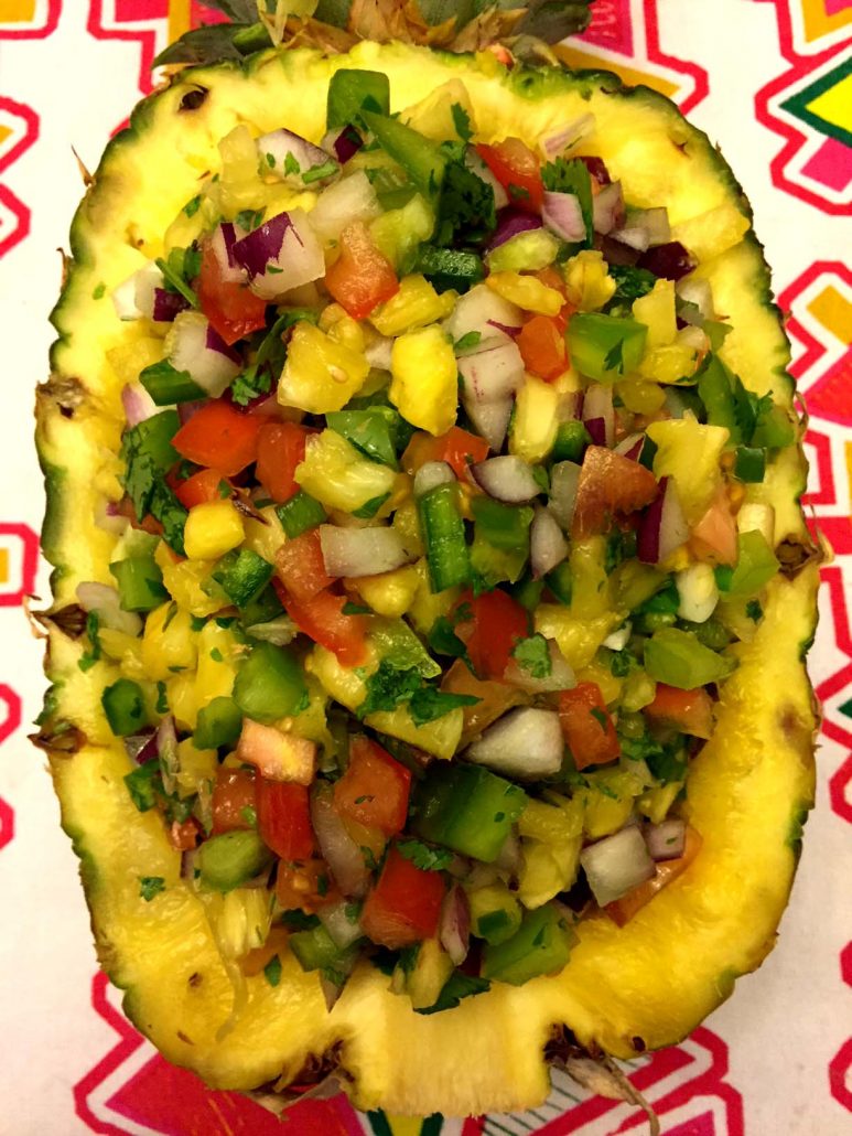 Pineapple Shell Bowl Filled With Fresh Pineapple Salsa
