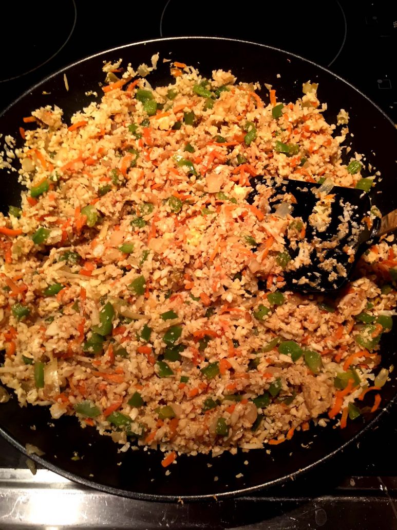 Making Cauliflower Fried Rice On A Frying Pan