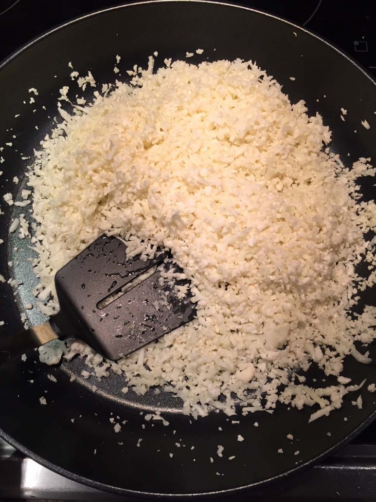 Cooking Cauliflower Rice On A Frying Pan