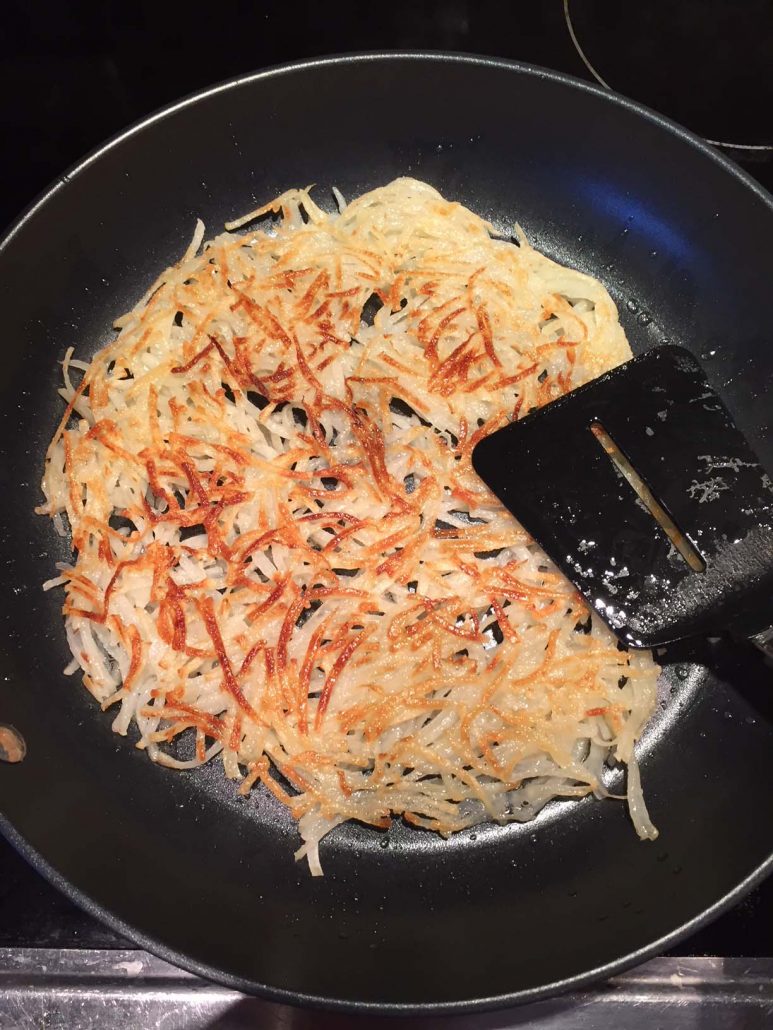Flipping Hashbrowns With A Spatula
