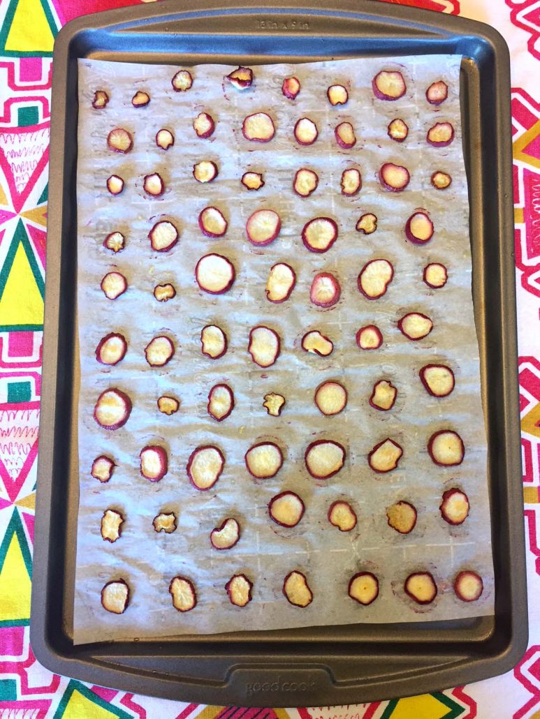 Radish chips on a baking sheet