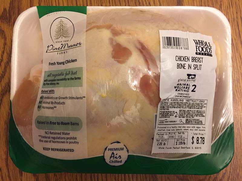 Package of bone-in skin-on chicken breasts