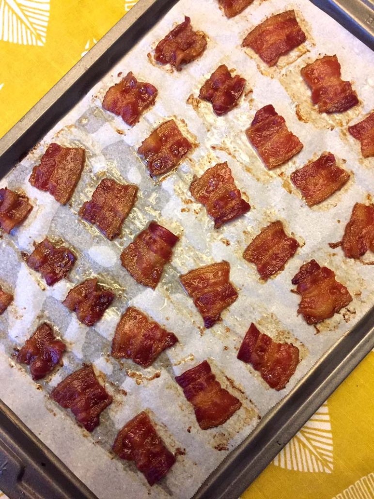 Baked Bacon Chips On A Baking Sheet