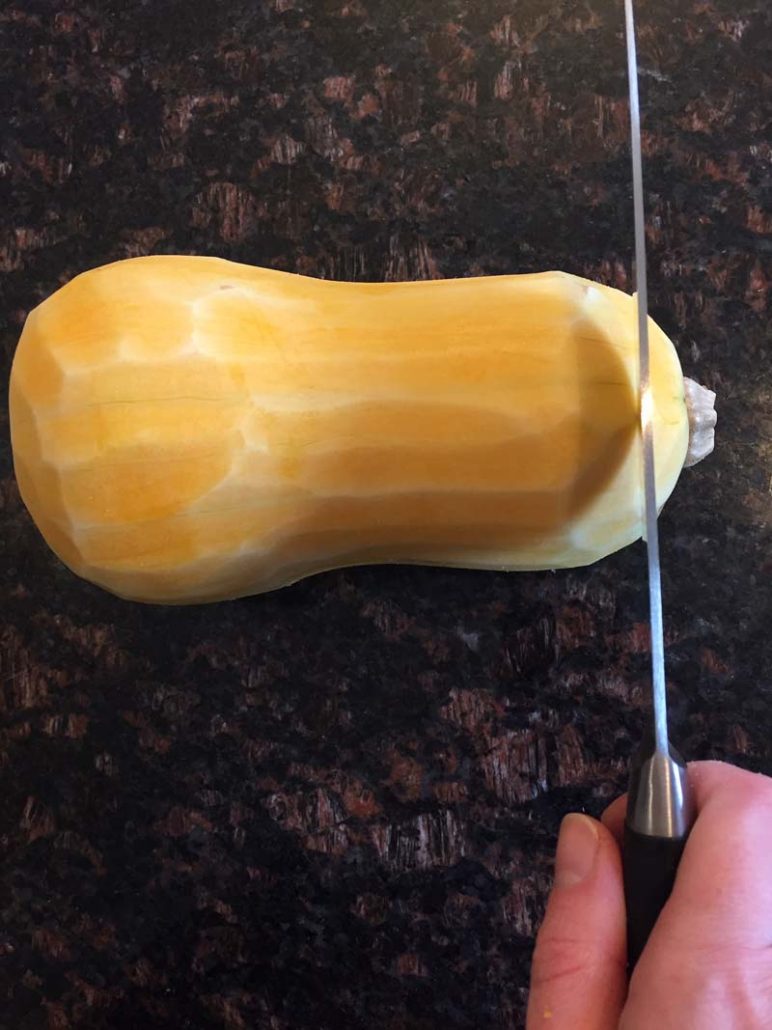 Cutting off the ends of butternut squash