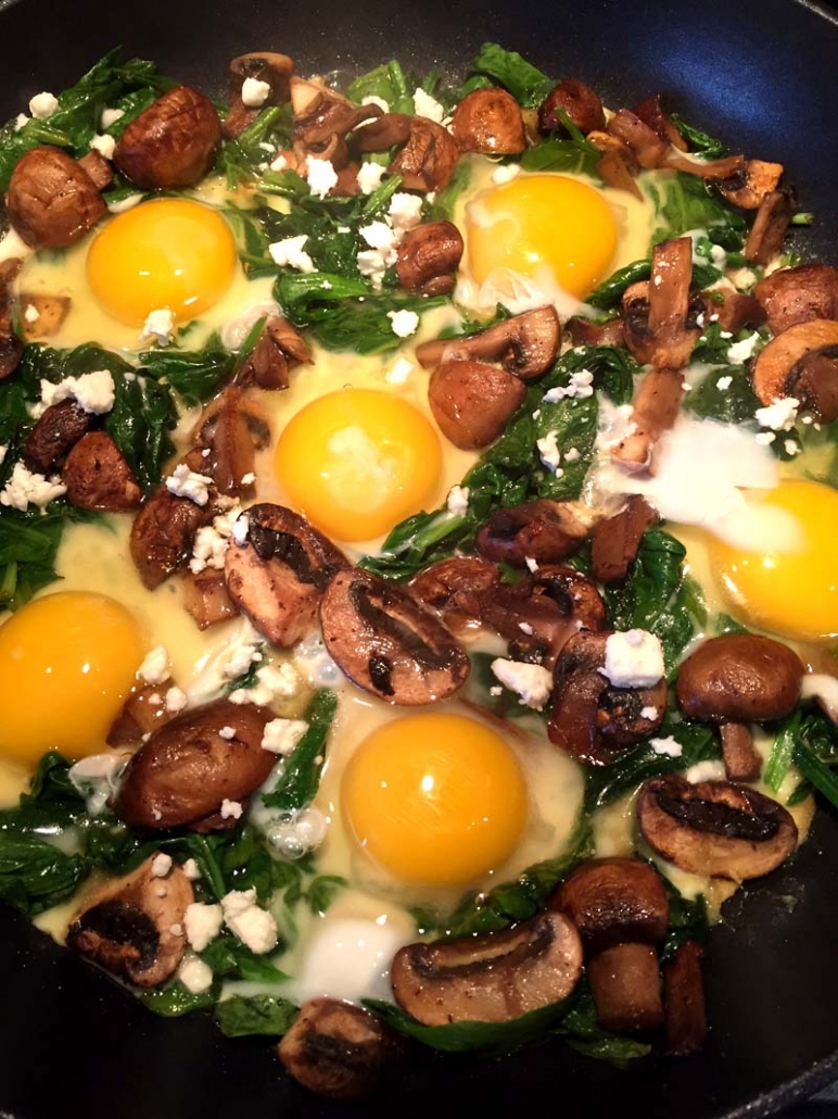 spinach mushroom feta eggs in a nest