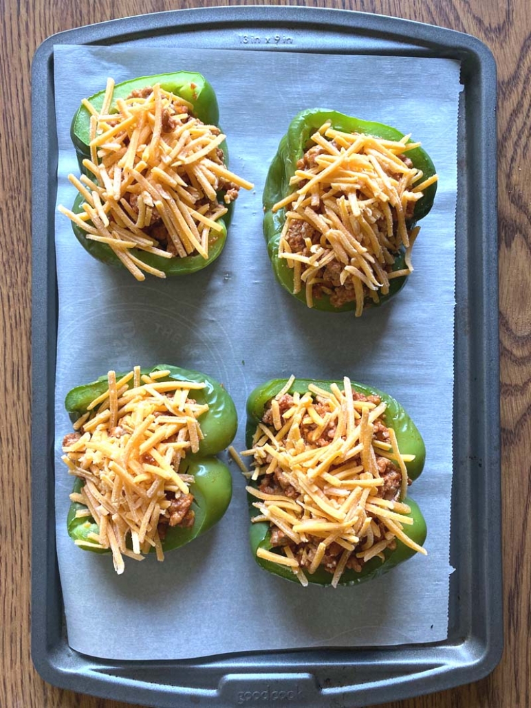 stuffed pepper halves with shredded cheese