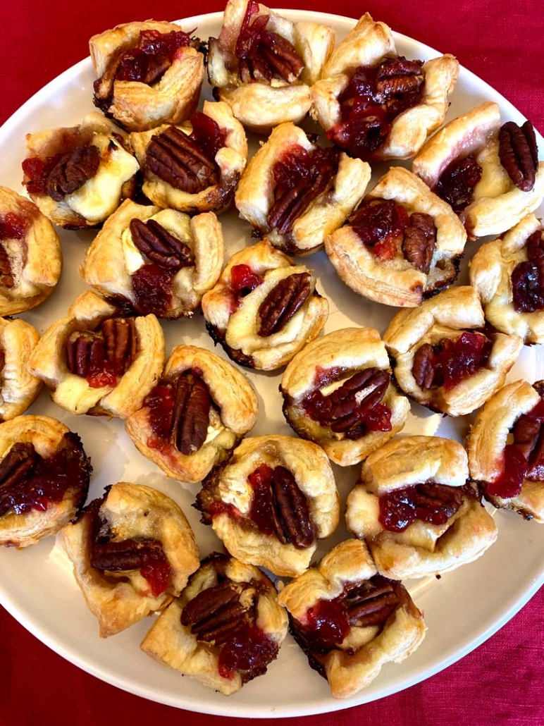 puff pastry cups with melted brie and cranberry sauce