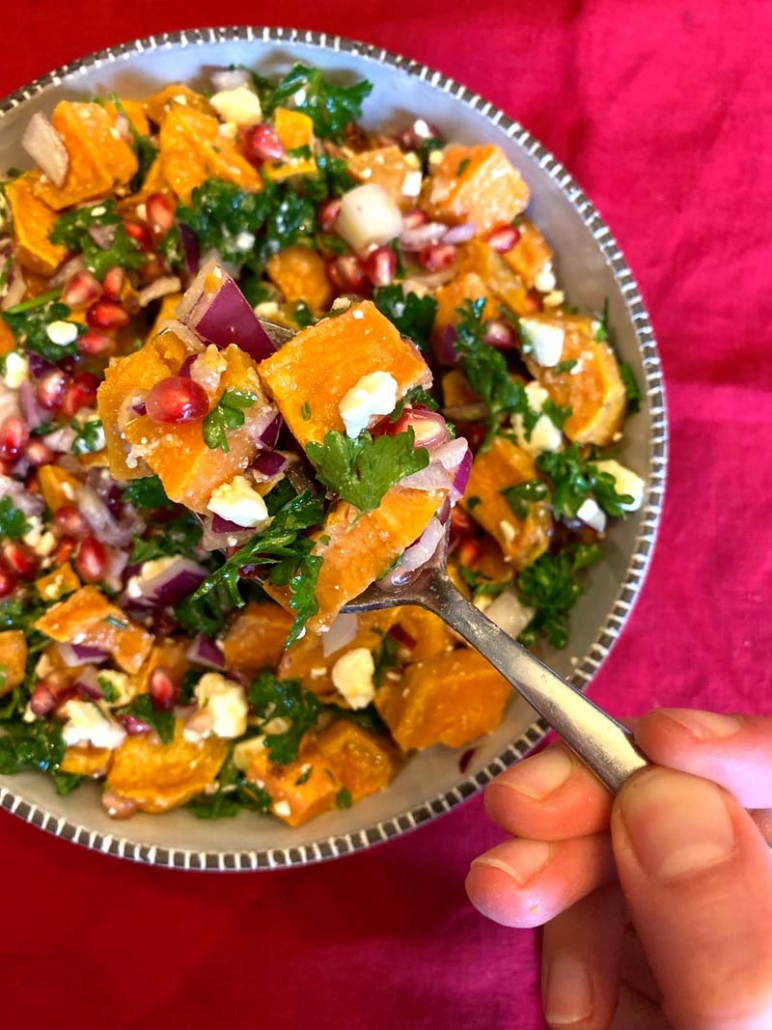 holiday salad with sweet potatoes and pomegranate