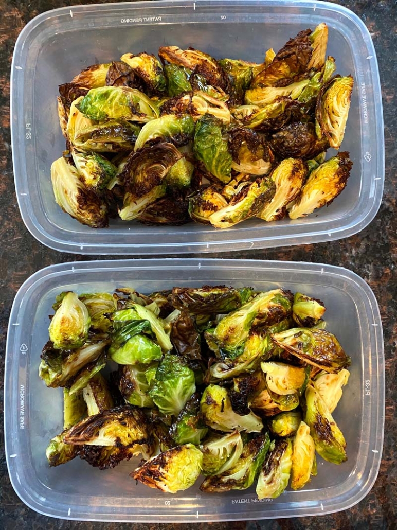 meal prepping brussel sprouts in clear containers